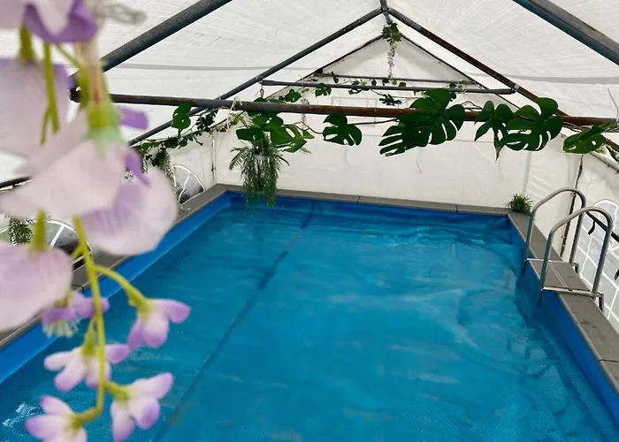 Mini Love Island Style Guest House Includes Personal Hot 24 Hour Swimming Pool, Outdoor Bathtub, Heated Dining Dome And Fire Pit, All This Is Secretly Located In The Busy Suburbs Of Nottingham
